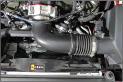A 250-609 POWERAID Throttle Body Spacer installed on a 2016 Chevrolet Camaro 3.6L V6