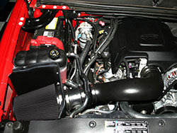 The AIRAID cold air dam virtually seals off the air filter from the hot underhood area.