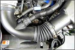 Stock intake tubes usually include a variety of noise-canceling baffles and corrugated sections