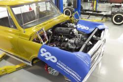 View of C10 engine bay with Mast Motors LS7, FAST Intake and Holley Fuel System