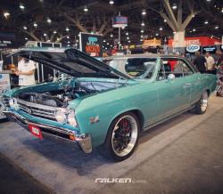 Photo of the W2W '67 Chevelle in the Classic Performance Products booth at SEMA - hood up.